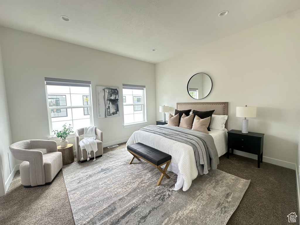 Bedroom with carpet floors and recessed lighting