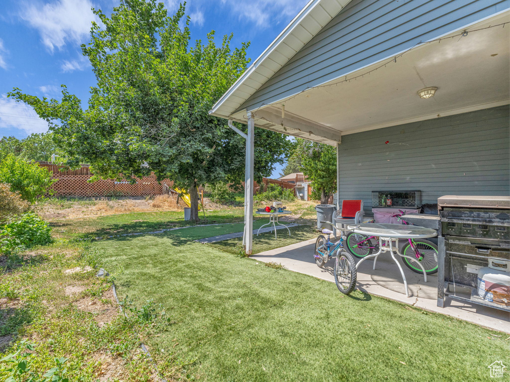 View of yard with a patio