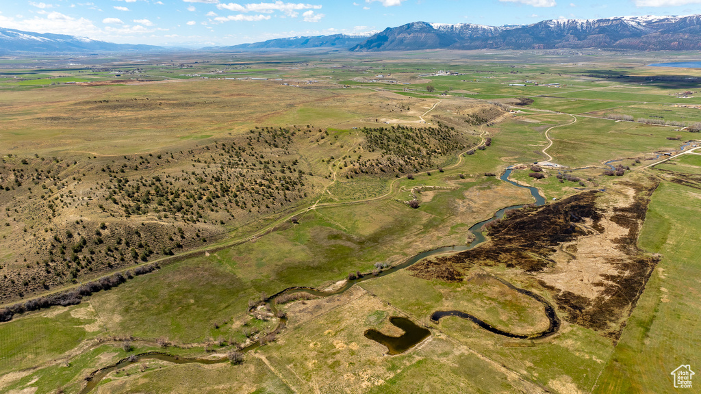 Aerial view of property\\\'s location featuring a mountainous background and rural landscape