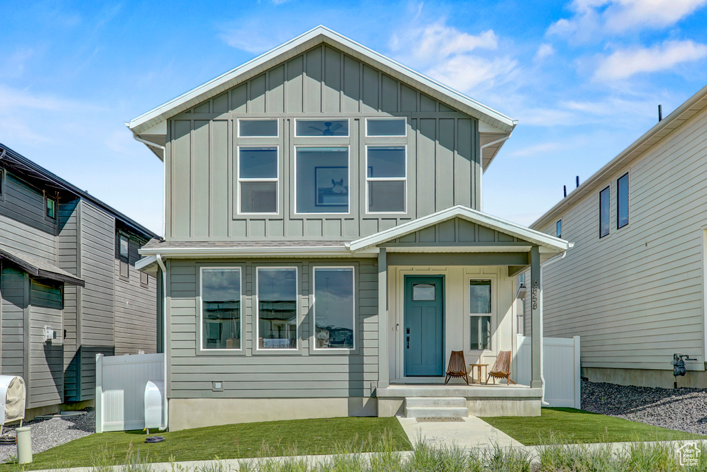 View of front of home with board and batten siding