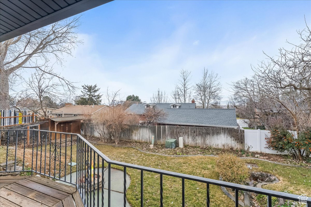 View of fenced backyard