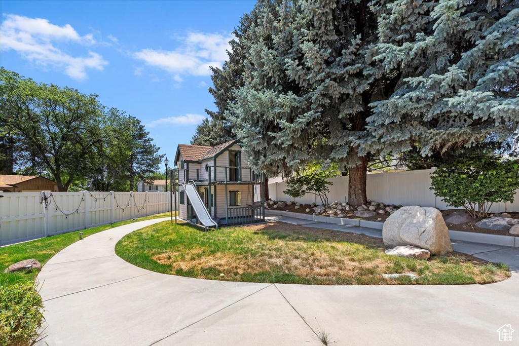 View of property exterior with a fenced backyard