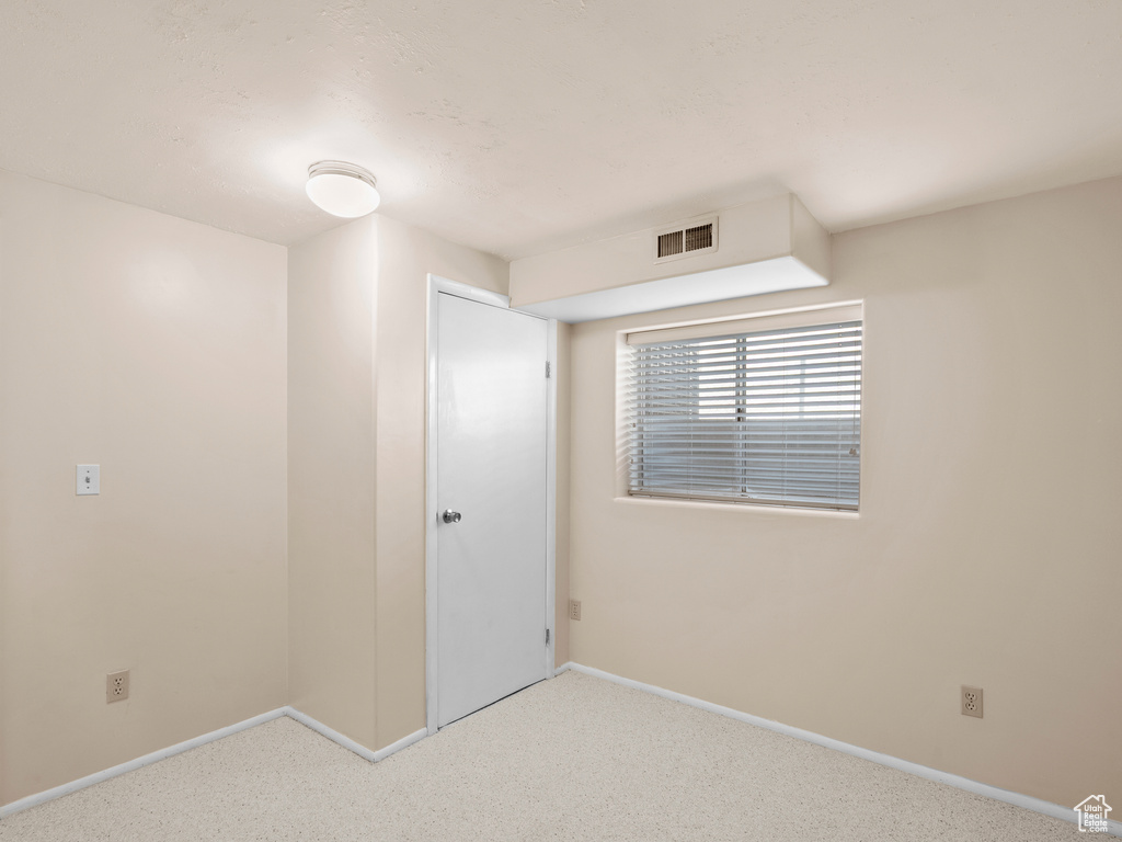 Unfurnished bedroom featuring carpet floors
