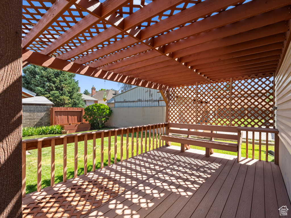 Deck featuring a pergola
