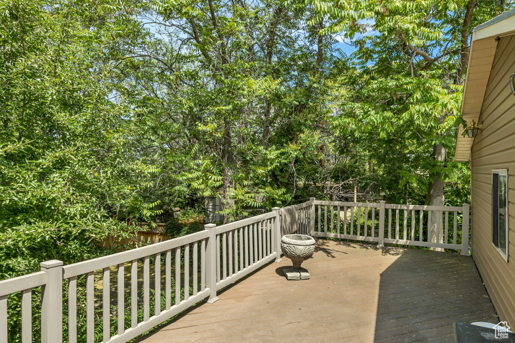 View of patio featuring a wooden deck