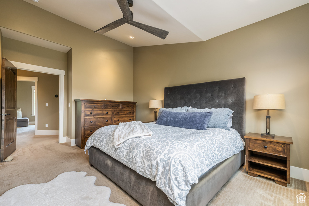 Bedroom with light carpet and ceiling fan