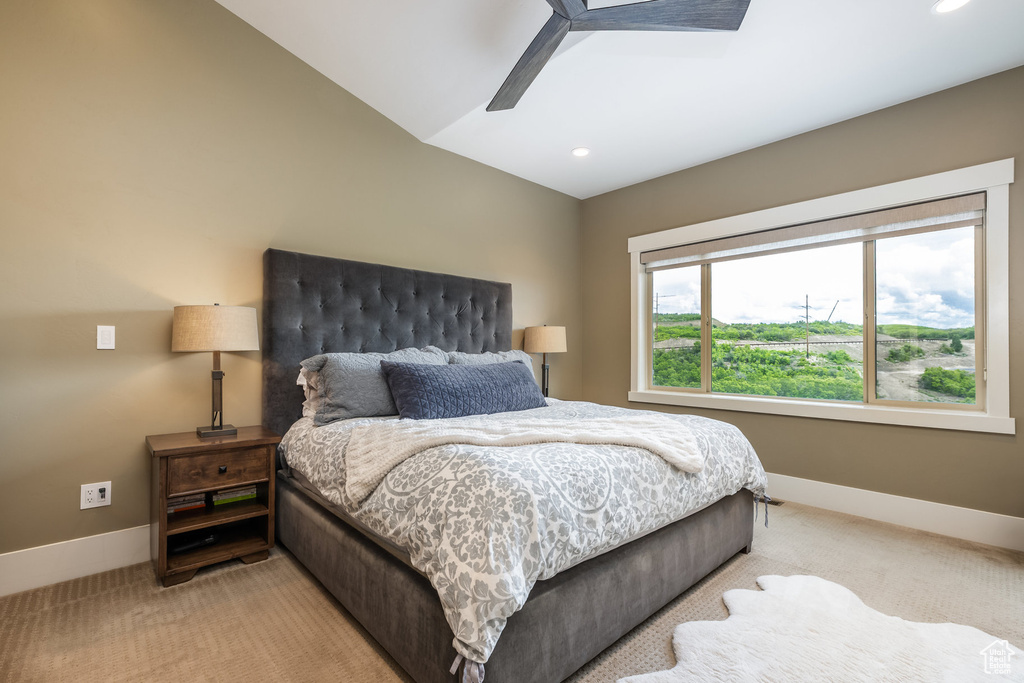 Bedroom featuring light carpet, recessed lighting, lofted ceiling, and ceiling fan