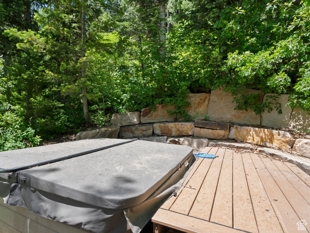 Deck featuring a hot tub