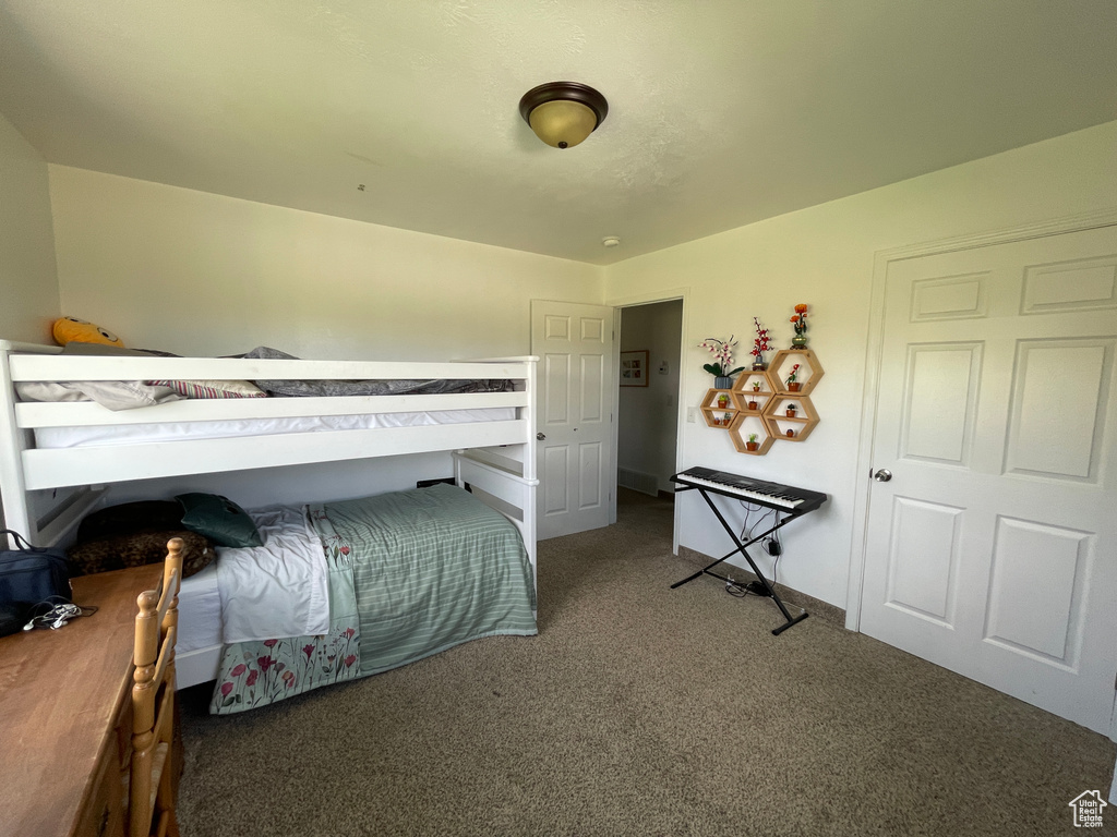 Bedroom with carpet flooring