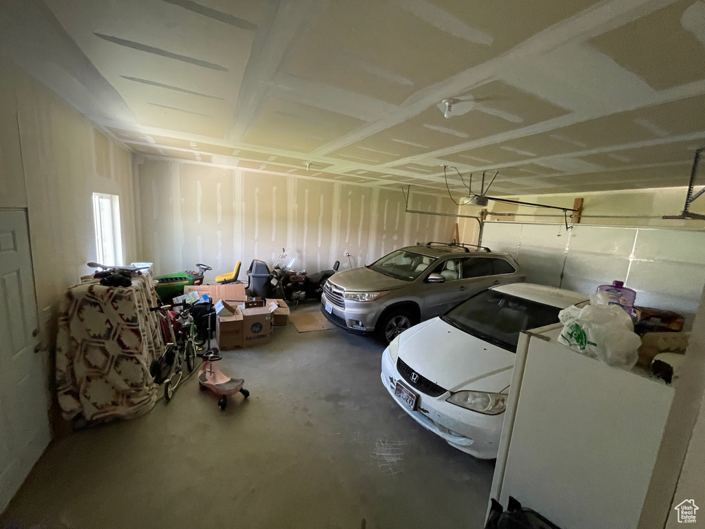 Garage featuring a garage door opener