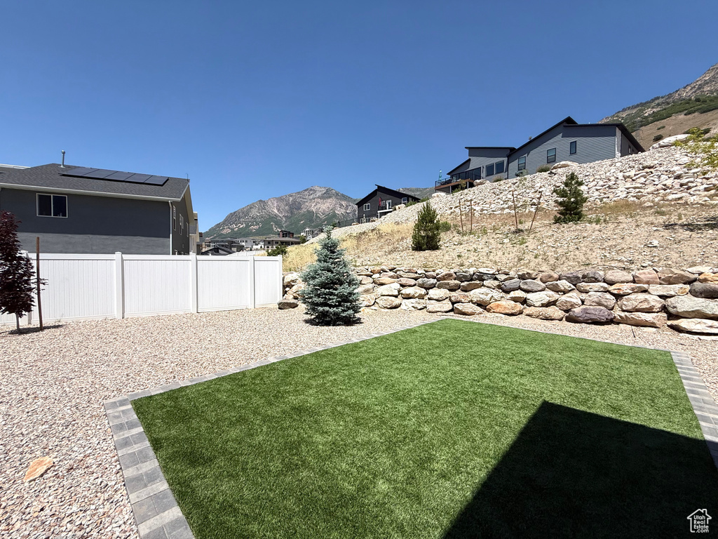 View of yard with a mountain view