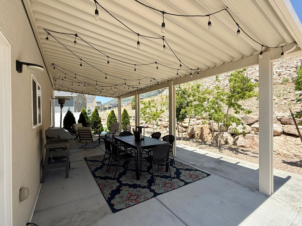 View of patio / terrace featuring a grill, outdoor dining area, and outdoor lounge area