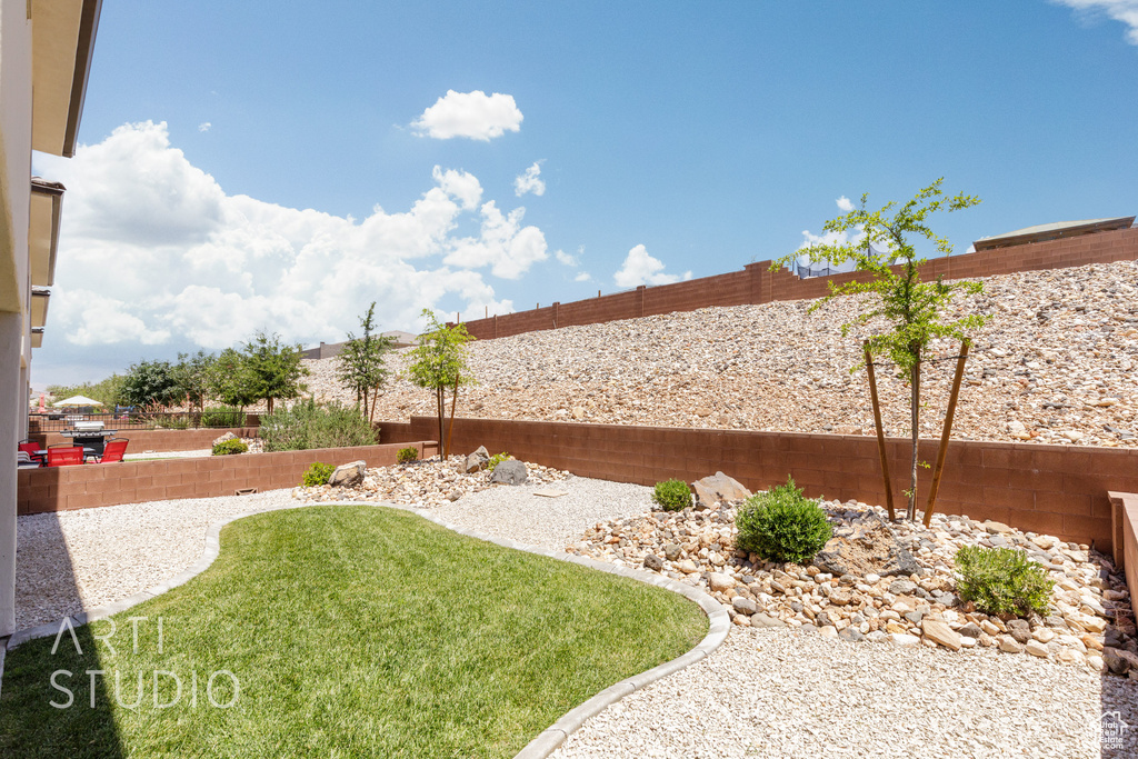 View of fenced backyard
