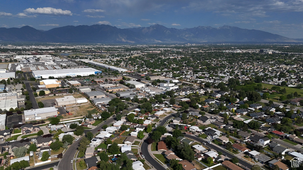 Aerial view of property's location with nearby suburban area