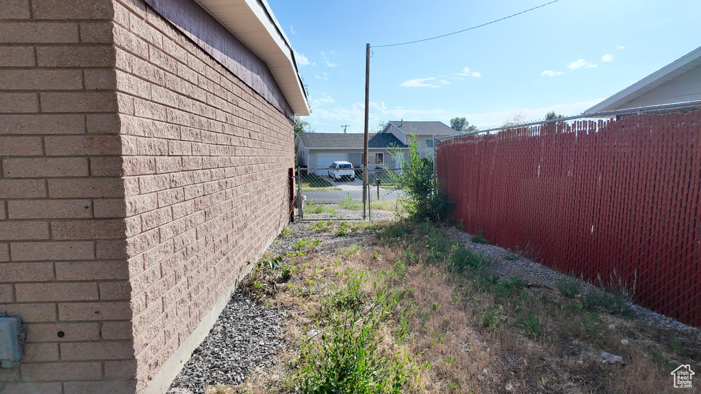 View of home's exterior with brick siding