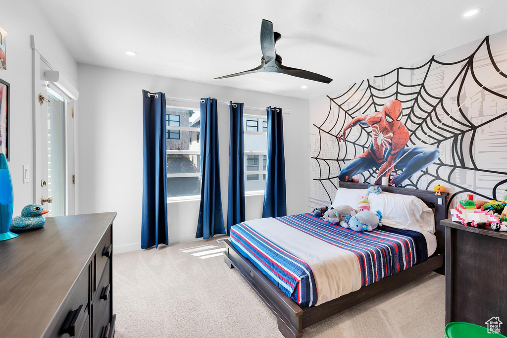 Bedroom featuring light colored carpet, recessed lighting, and a ceiling fan