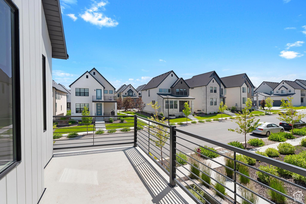 Balcony featuring a residential view