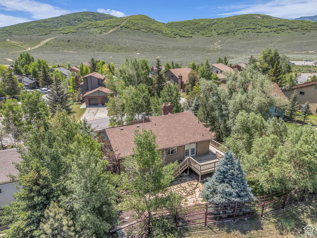 View of subject property with a mountainous background