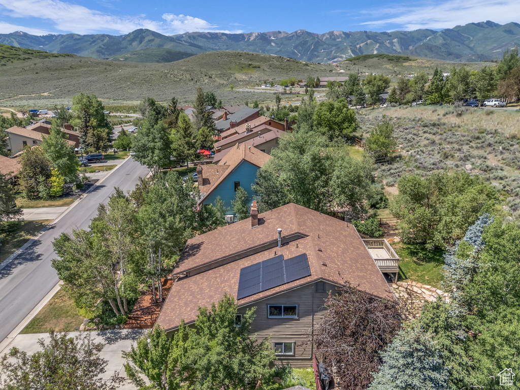 View of subject property with mountains