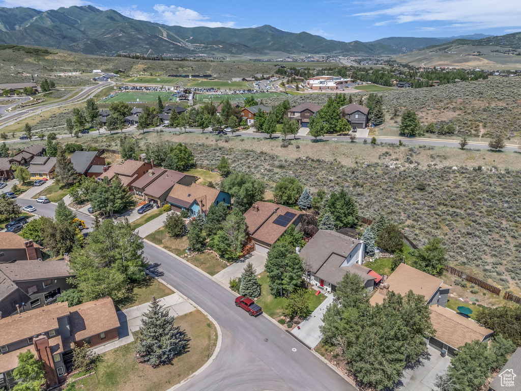 Aerial view of residential area with a mountain backdrop