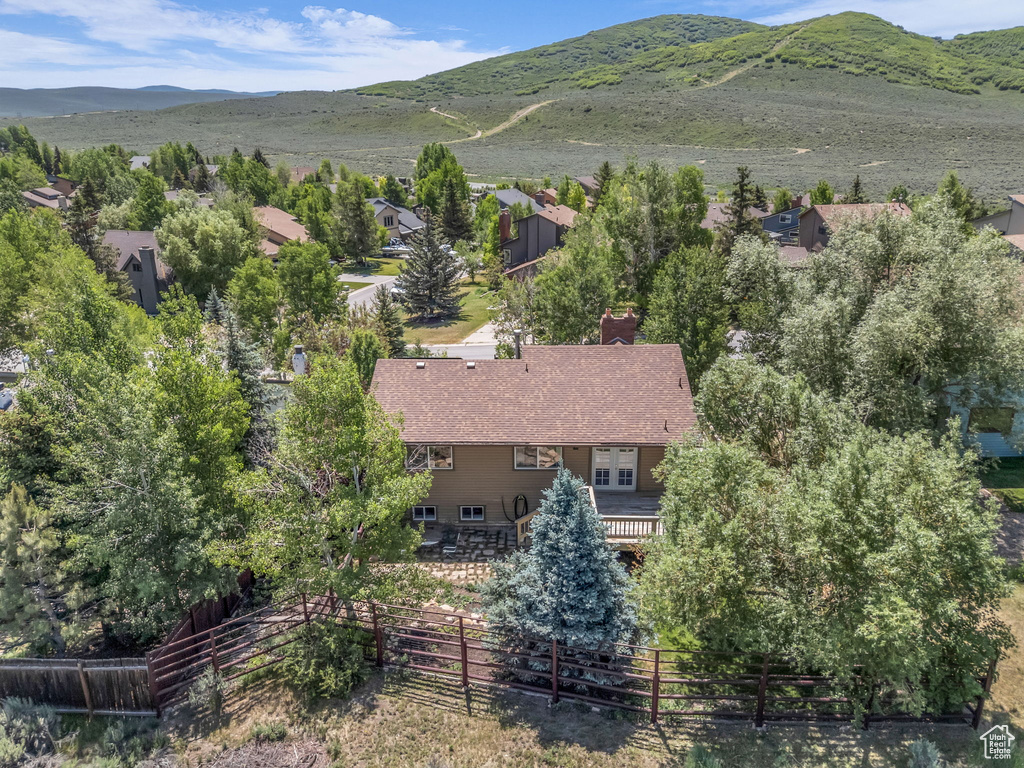 View of subject property with a mountain backdrop