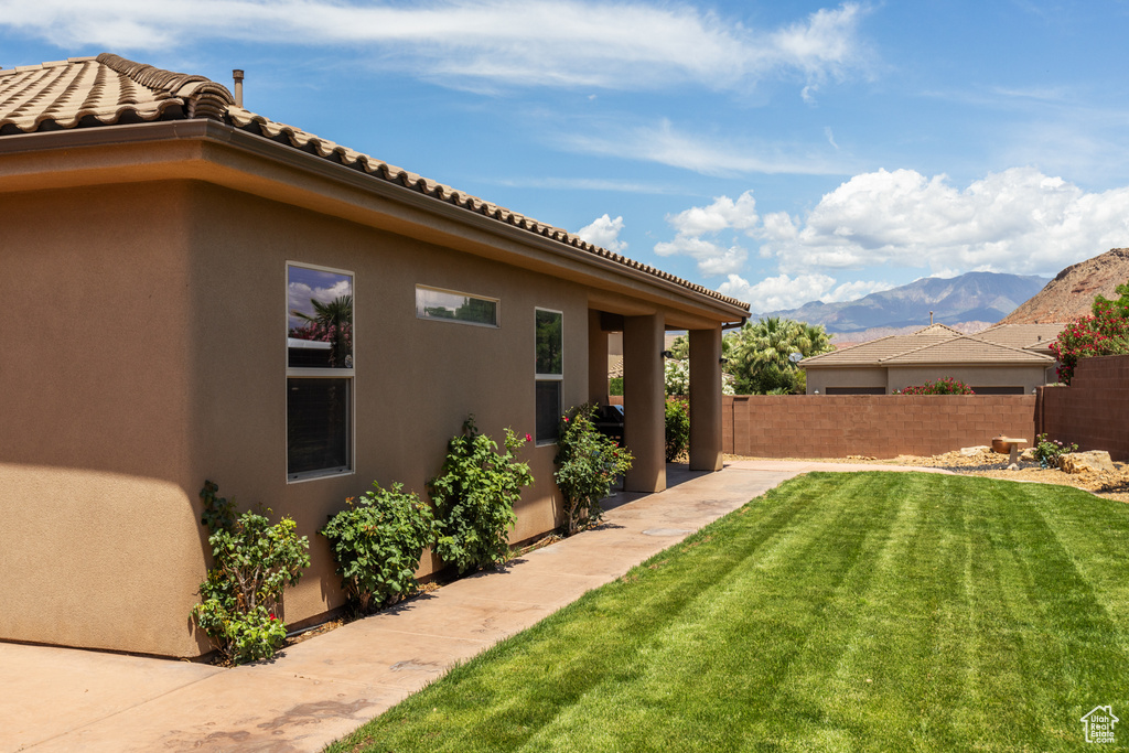 View of yard with a mountain view