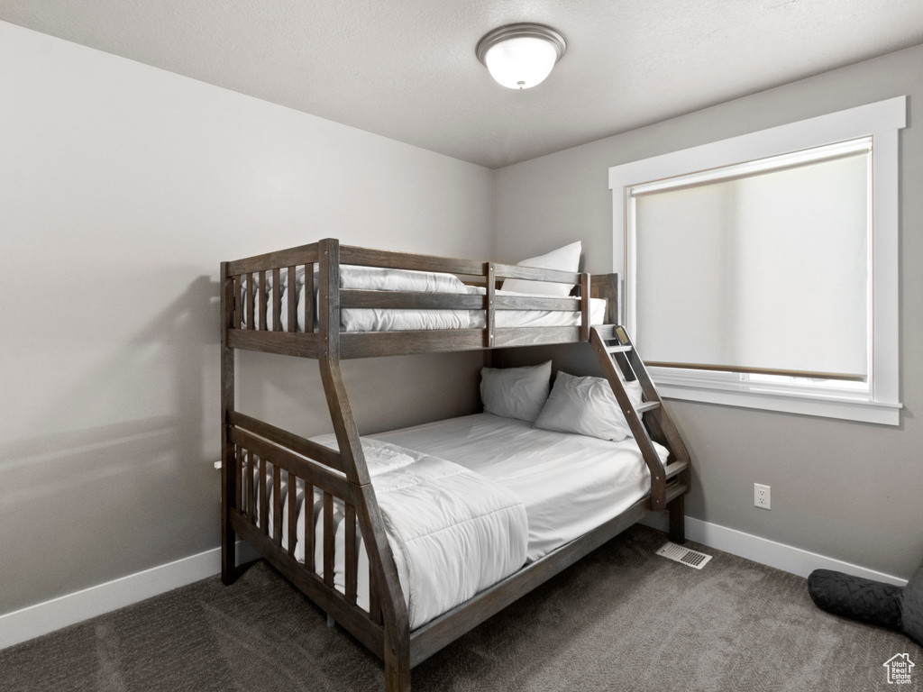 Bedroom with carpet