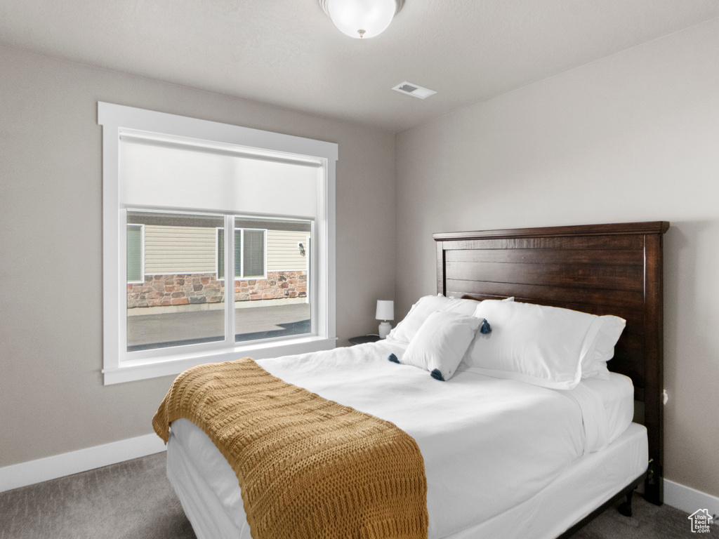 Bedroom with carpet floors