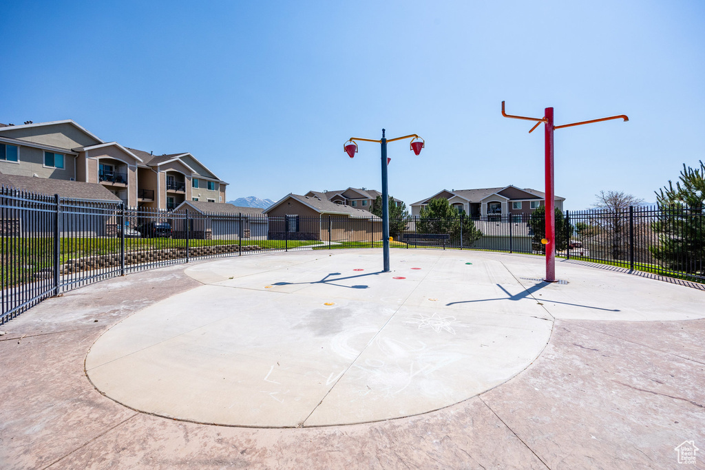 View of sport court with a residential view