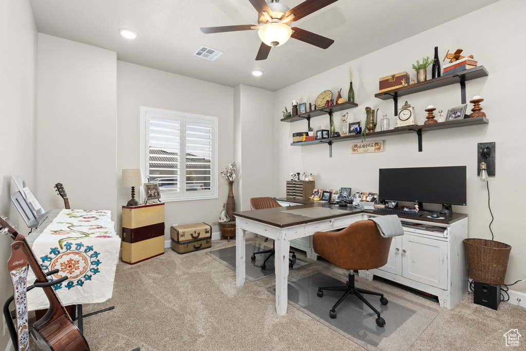 Home office with light colored carpet, a ceiling fan, and recessed lighting