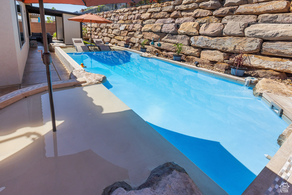 View of pool featuring a patio area