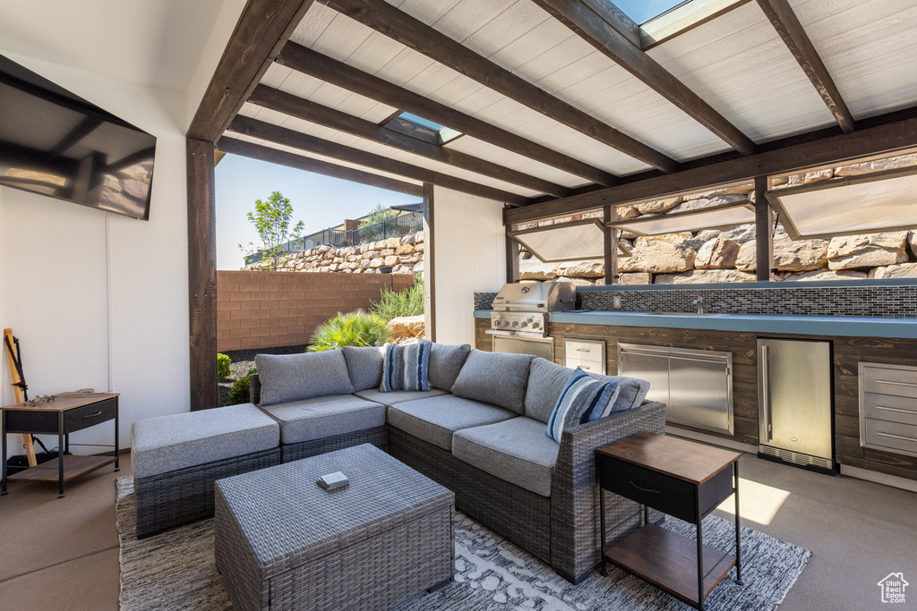 View of patio / terrace with exterior kitchen and an outdoor hangout area