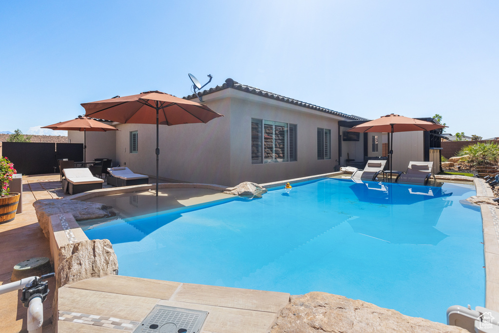 View of pool with a patio area