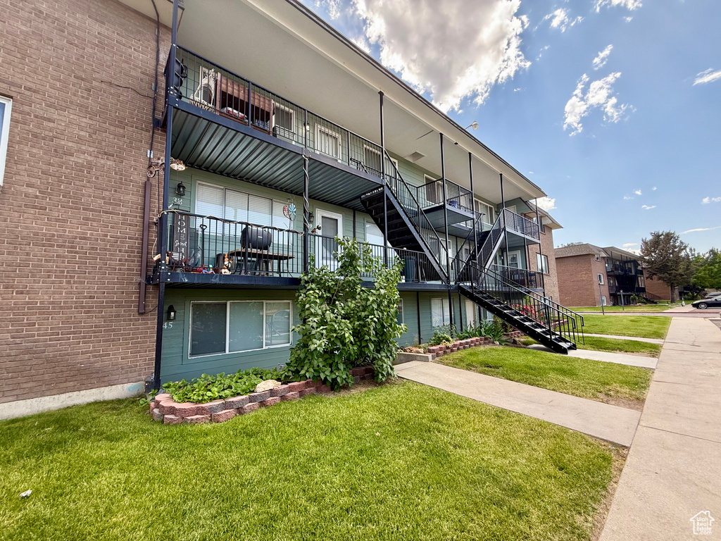 View of building exterior featuring stairway