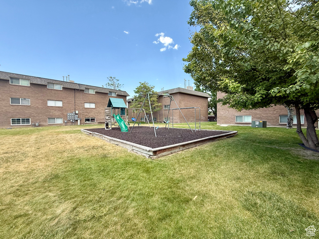 View of green lawn with a playground