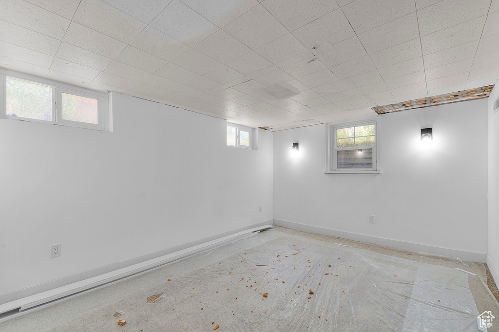 Basement featuring baseboards