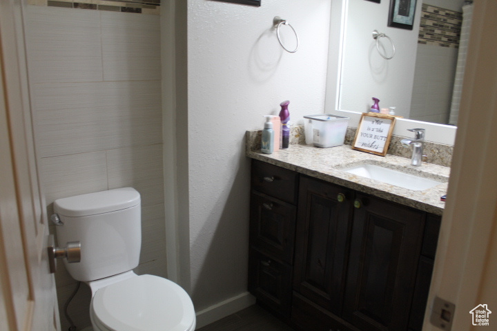 Bathroom featuring toilet and vanity