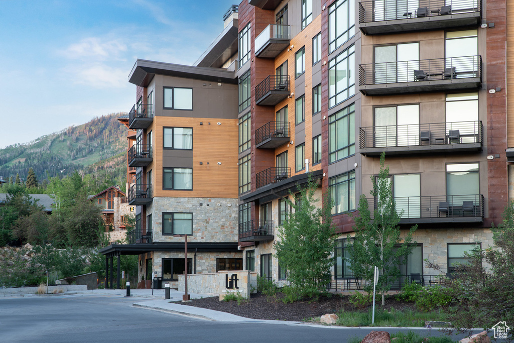 View of apartment building / complex with a mountain view