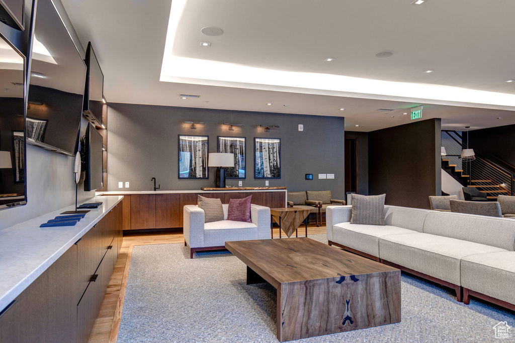 Common area featuring stairs and recessed lighting
