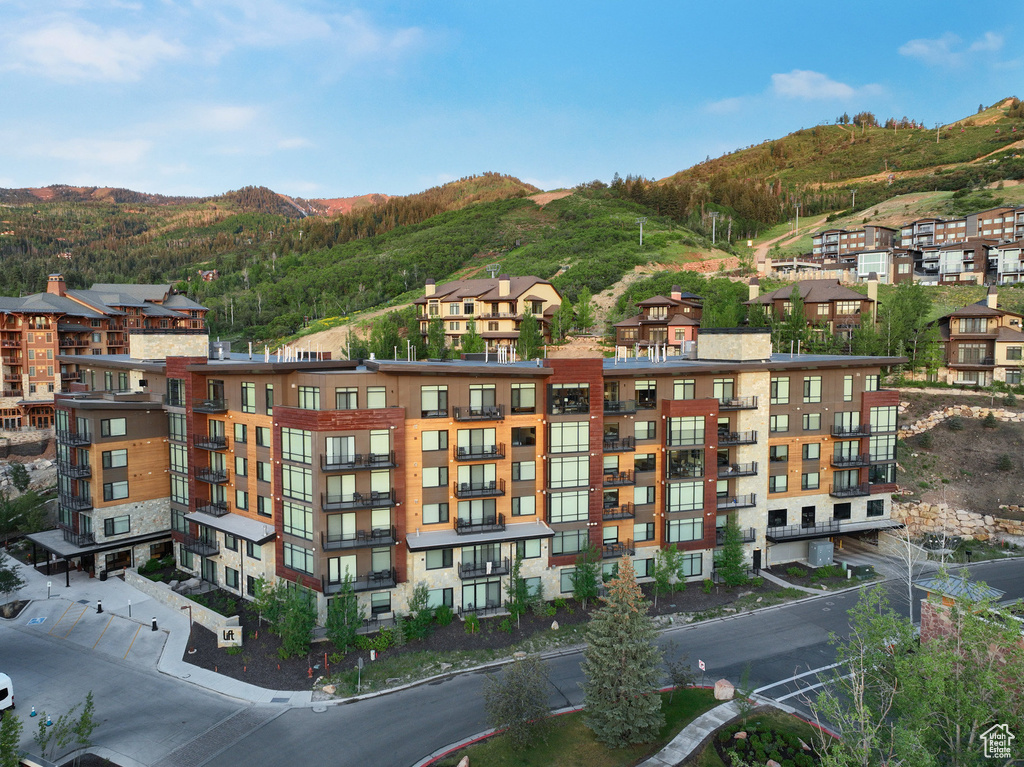 View of apartment building / complex with a mountain view