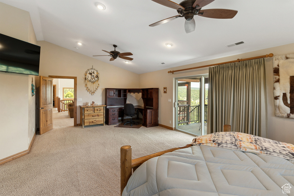 Bedroom featuring access to outside, light colored carpet, vaulted ceiling, a desk, and ceiling fan