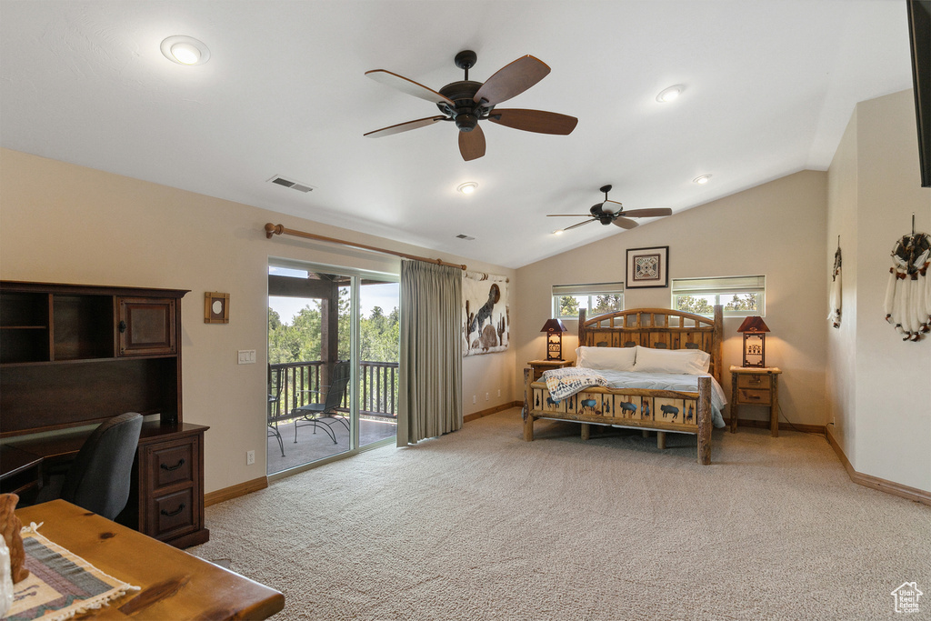Bedroom featuring access to outside, an office area, light carpet, lofted ceiling, and a ceiling fan