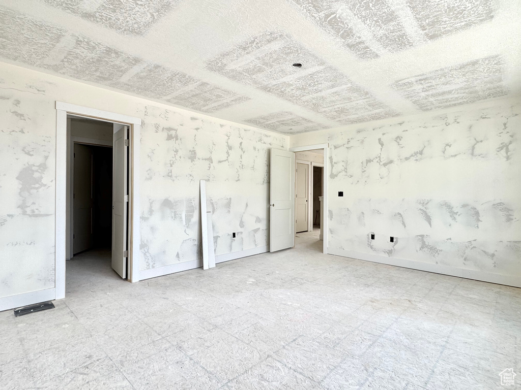 Unfurnished bedroom featuring baseboards