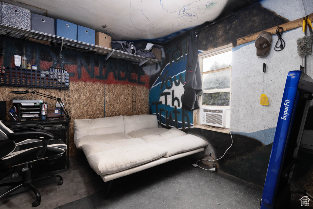 Interior space featuring an office area and cooling unit