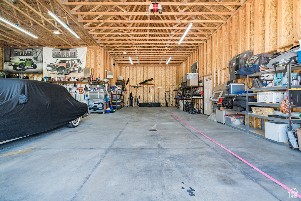 Garage featuring a workshop area