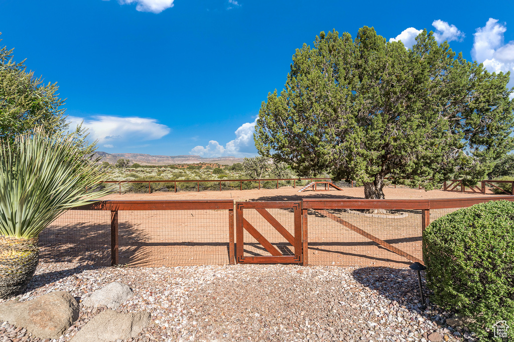 View of yard with a gate