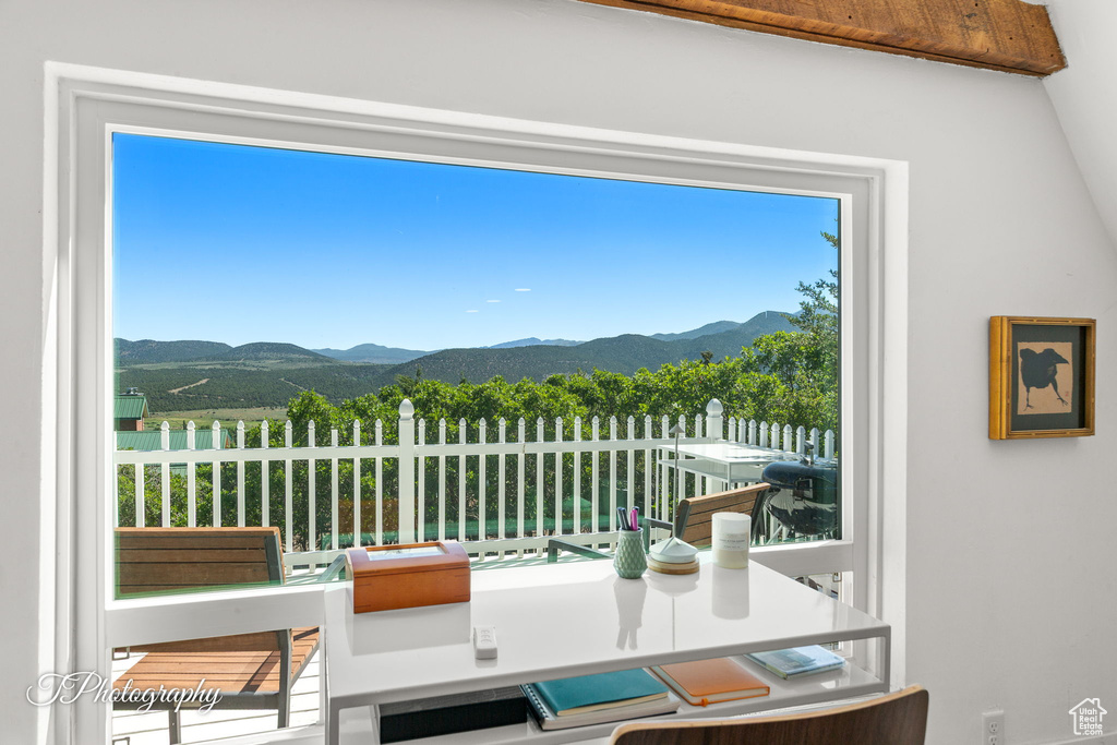 Dining room featuring a mountain view