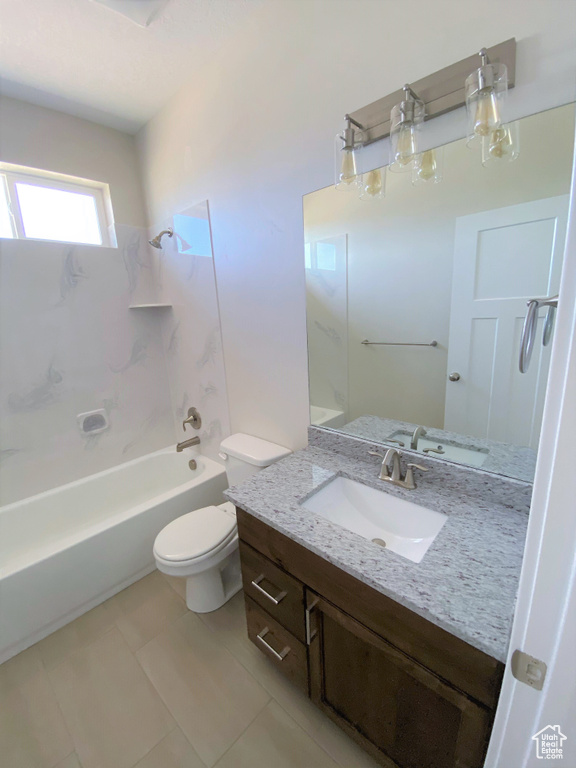 Full bathroom with vanity, tile patterned flooring, and bathing tub / shower combination