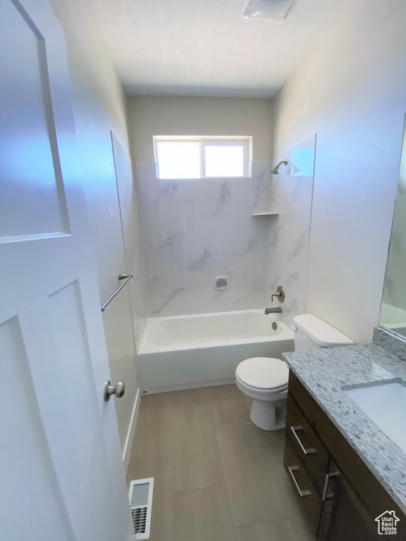 Full bath featuring vanity and shower / washtub combination