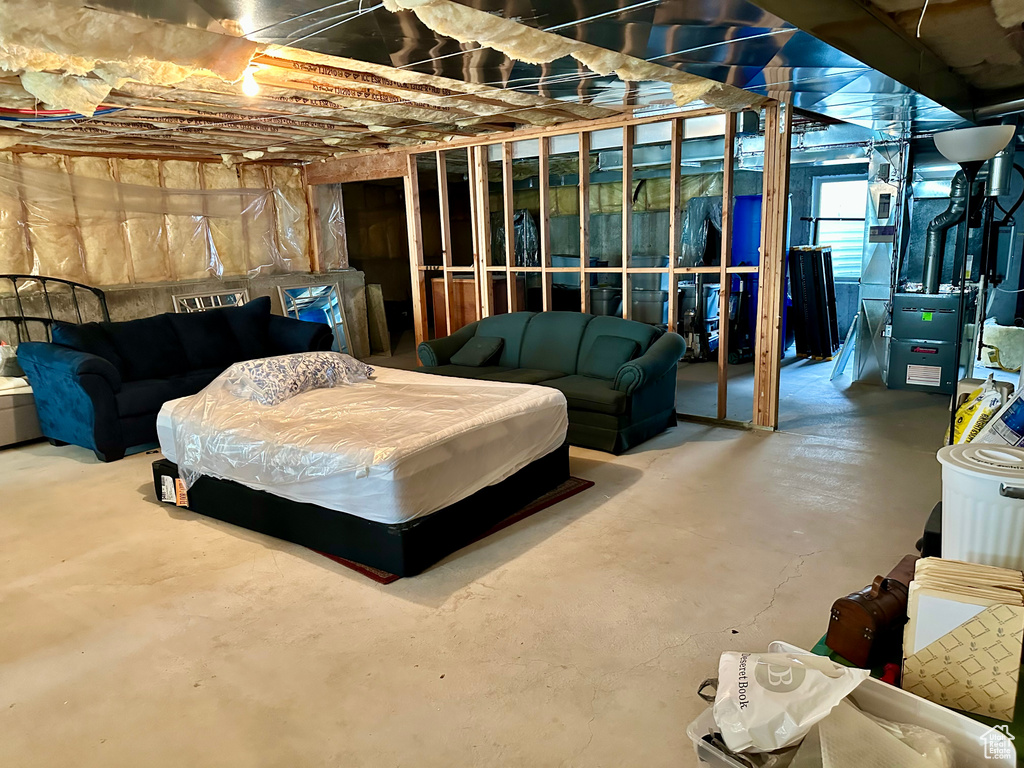 Below grade area featuring heating unit
